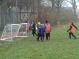 Voetbalpieten bezoeken training S.K.N.W.K. JO9-1 en JO7-1 op zaterdag 4 december 2021 (15/75)